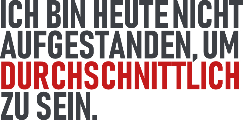 Der fettgedruckte deutsche Text lautet: ICH BIN HEUTE NICHT AUFGESTANDEN, UM DURCHSCHNITTLICH ZU SEIN. Das Wort DURCHSCHNITTLICH ist rot hervorgehoben, der Rest ist schwarz. Der Hintergrund ist weiß.